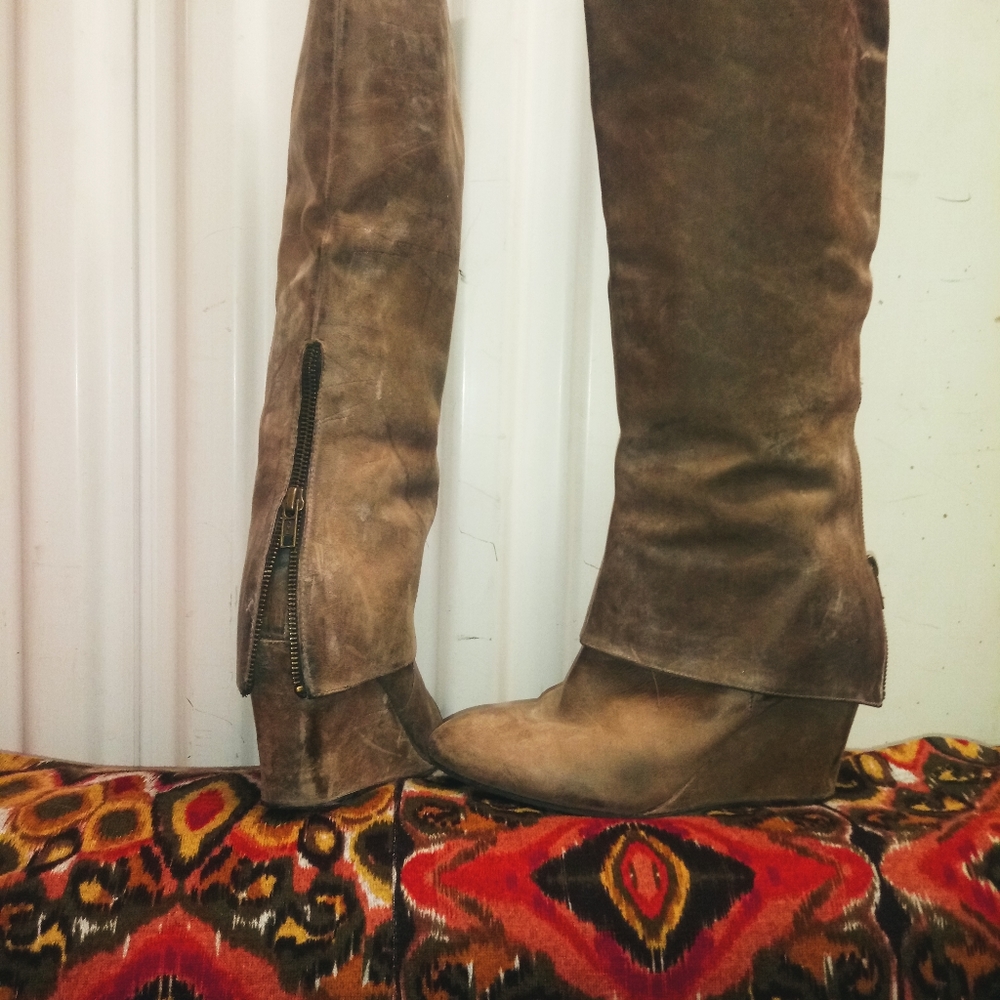 Knee high wedge boots by steven